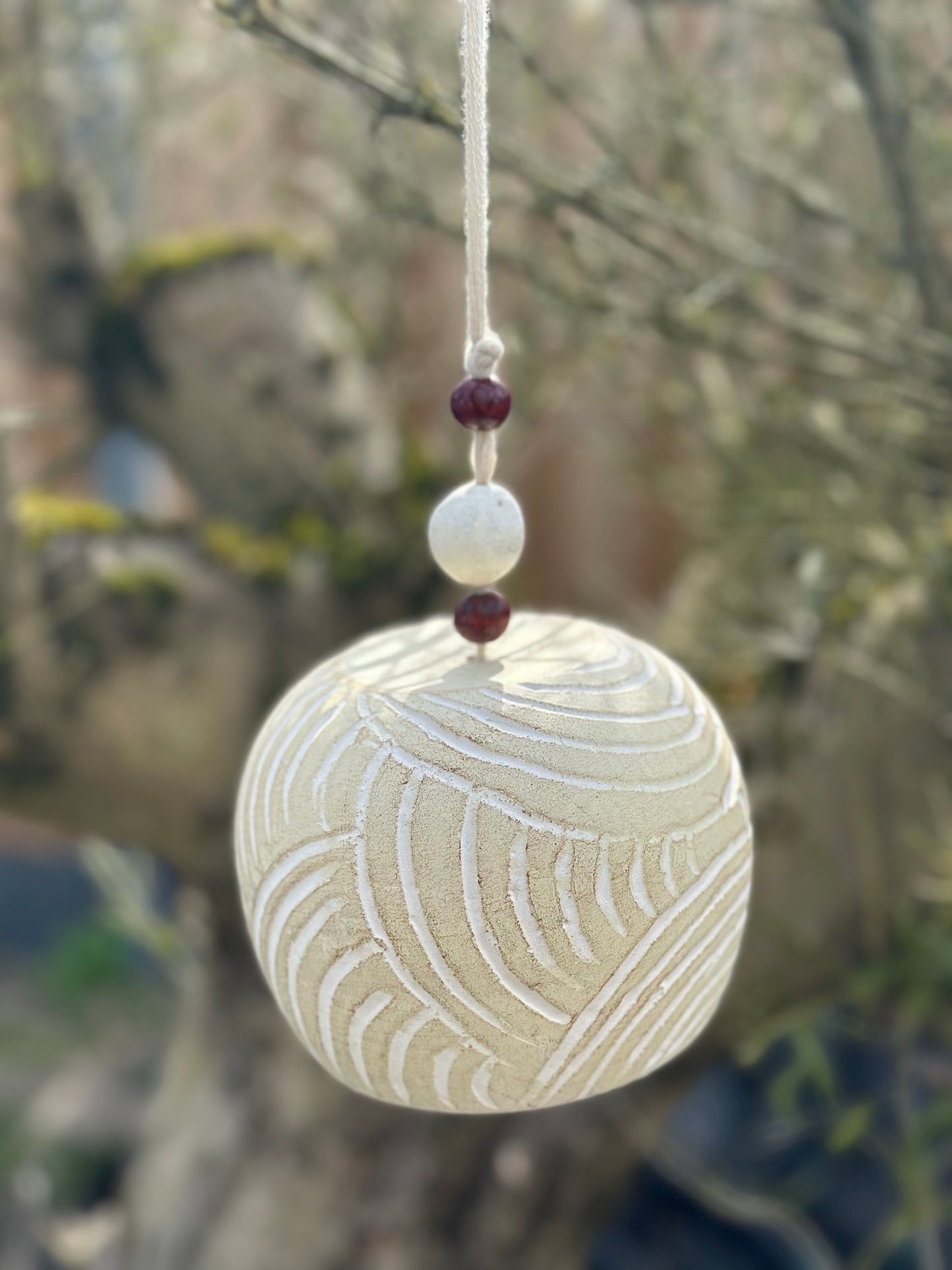 Hangbel terracotta - zand/ecru