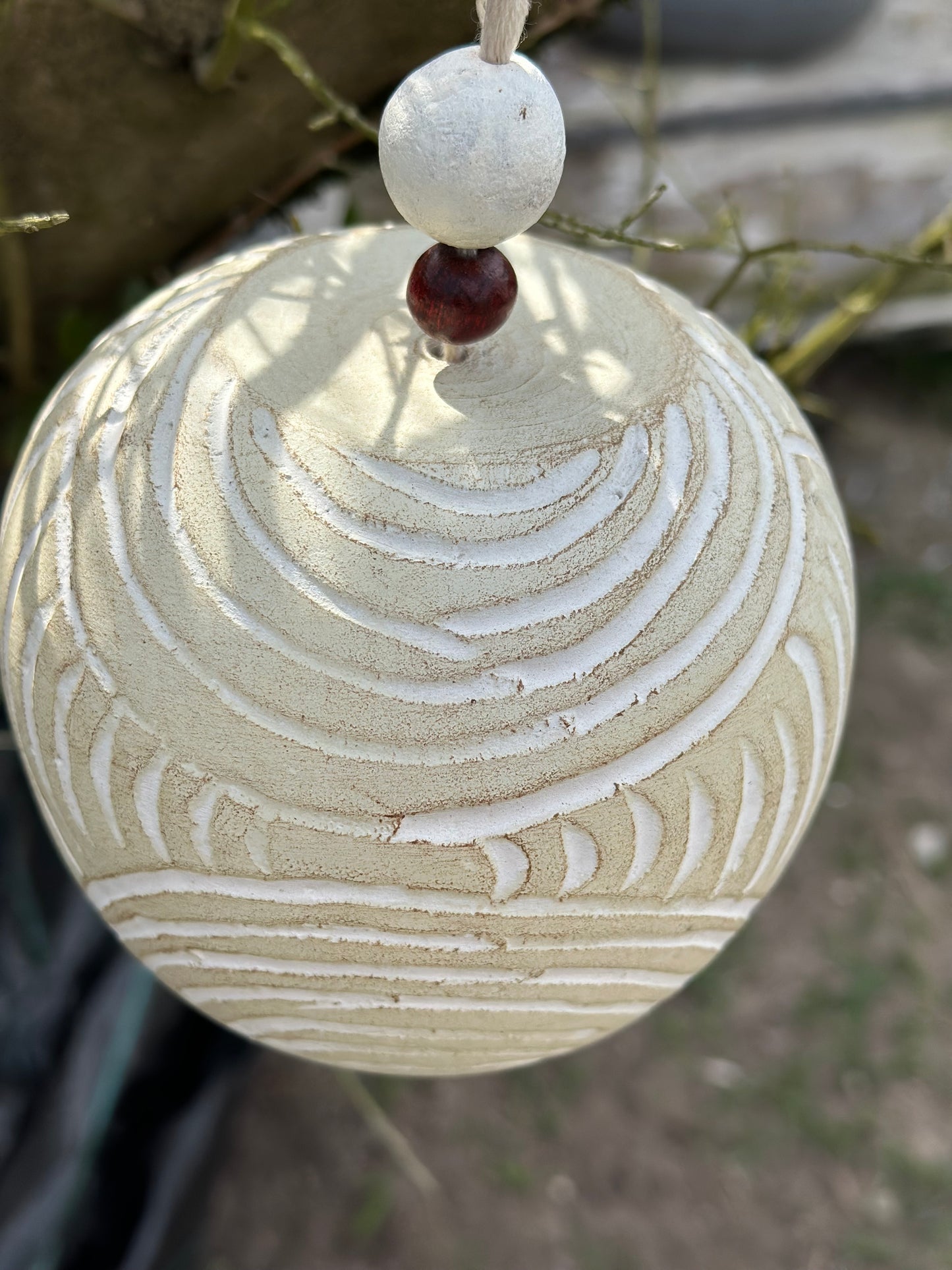 Hangbel terracotta - zand/ecru